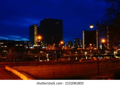 Paris, France - April 2022 -  Night View In The Dark Of The Towers Of The François Mitterrand French National Library (BNF), On Quai Mauriac, In The Neighborhood Of Bercy (12th Arrondissement)