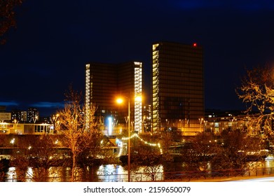 Paris, France - April 2022 -  Night View In The Dark Of The Towers Of The François Mitterrand French National Library (BNF), On Quai Mauriac, In The Neighborhood Of Bercy (12th Arrondissement)