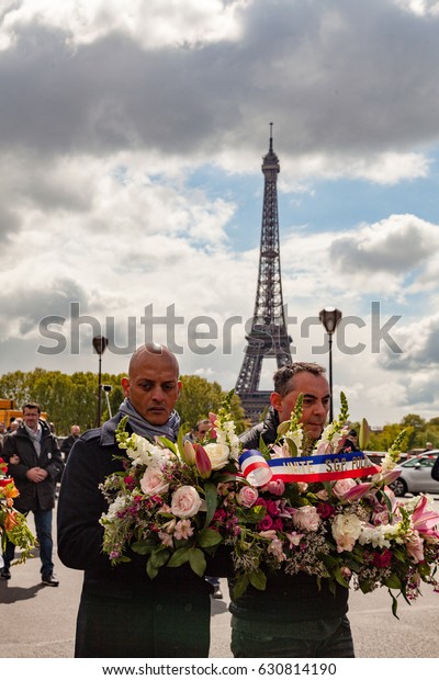 Paris,\
France - April 26, 2017 : Police officers protesting during the\
protest march against cuts and in tribute to Xavier Jugele, officer\
killed on Champs-Elysees by Daesh few days\
before.