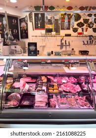 Paris, France - April 7, 2022: Vintage Butcher Display Filled With Meat Delicatessen. Selling And Buying Meat Store Counter. Raw Food In Grocery Supermarket