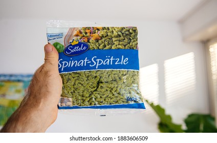 Paris, France - Aug 26, 2020: POV Personal Perspective At Delicious Package With German Food Spinat Spaetzle By Settele