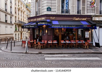 Paris, France - August 10, 2017. Typical Paris Street With French Restaurant Le Relais Gascon With Summer Terrace. View From The Street, No People.