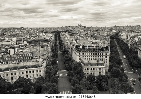 Paris,\
France - August 17: View of the Chaps-Elysees Avenue from the Arc\
de Triomphe in Paris, France on August 17,\
2014.