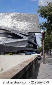 Paris, France - August 24, 2022: Paris Philharmonic. Huge Aluminum Building And Shiny Stainless Steel Facades In The Parc De La Villette.
