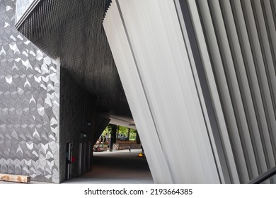 Paris, France - August 24, 2022: Paris Philharmonic. Huge Aluminum Building And Shiny Stainless Steel Facades In The Parc De La Villette.
