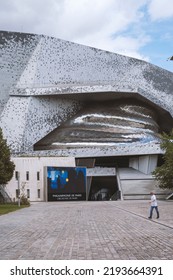 Paris, France - August 24, 2022: Paris Philharmonic. Huge Aluminum Building And Shiny Stainless Steel Facades In The Parc De La Villette.
