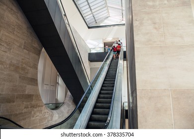 PARIS, FRANCE - AUGUST 30, 2015: Wide Angled View To Perspective Escalators Stairway. Louvre Indoor On August 30 In Paris, France.