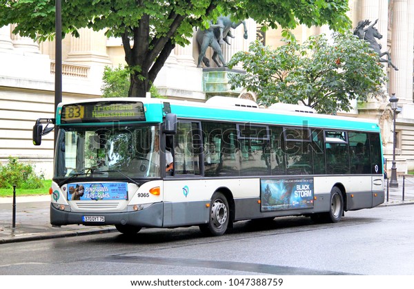 Paris, France - August 8, 2014: Urban bus Scania\
OmniCity in the city\
street.