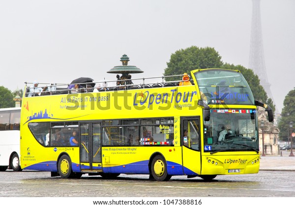 Paris, France - August 8, 2014: Touristic city\
bus Ayats Bravo in the city\
street.