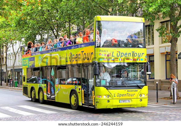 PARIS, FRANCE -\
AUGUST 8, 2014: Yellow city sightseeing bus Neoplan N4426/3\
Centroliner at the city\
street.