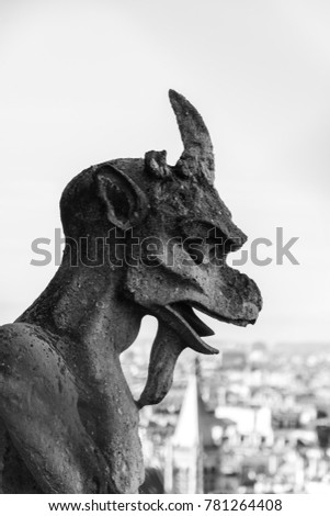 Similar – Image, Stock Photo Gargoyle on Notre Dame In Paris at sunset