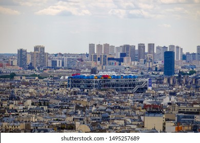 Paris, France - circa august, 2019: Panoramic cityscape from the top of Montmartre, Paris, the "light-city" and the most visited city of the world. Colorful Pompidou center on the background. 