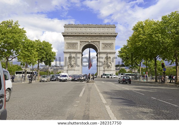PARIS, FRANCE. CIRCA MAY 2015. Due to the\
increasing pollution and smog in the City of Lights, the city\
recently introduced traffic restrictions including bans on driving\
to help with the air\
quality.