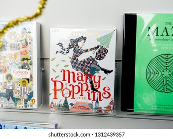 Paris, France - Dec 16, 2018: View from the street of bookstore stand with cover of Mary Poppins illustrated by Lauren Child