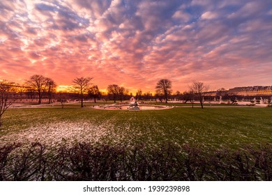 Paris, France - February 12, 2021: Tuileries Garden In Paris Covered With Snow At Beautiful Sunset