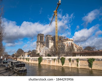 PARIS, FRANCE - February 17, 2020.: panoramic view of Notre-Dame de Paris being restored after the cathedral caught fire, destroying the spire and the oak frame and lead roof.