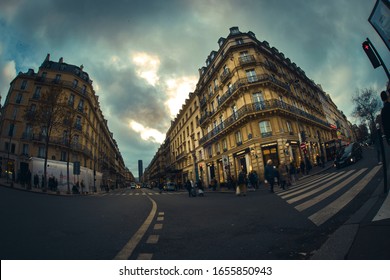 Paris, France, February 21 2020: General View From Paris City Centre, People Are Walking And Crossing The Street With Fish Eye Lens