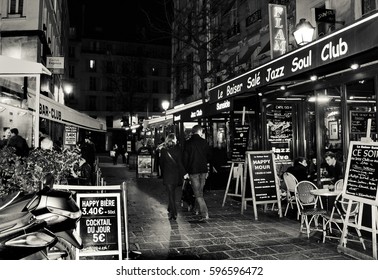 PARIS, FRANCE - FEBRUARY 26, 2017: Famous Parisian Jazz Clubs And Pubs At Lombards Street (Rue Des Lombards).