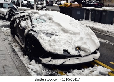 Paris, France - February 6th 2018 : Lamborghini Huracán Performante Parked In A Street, Under Snow (face).