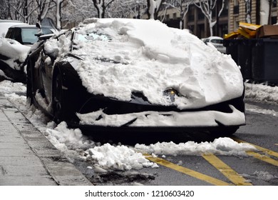 Paris, France - February 6th 2018 : Lamborghini Huracán Performante Parked In A Street, Under Snow (face).