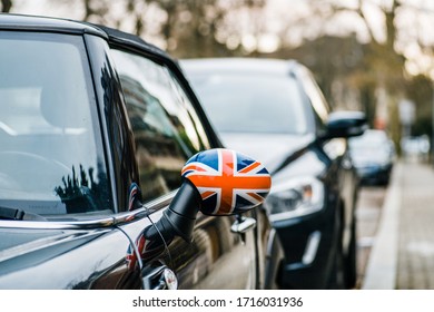 Paris, France - Jan 28, 2019: United Kingdom Union Jack Flag On The Rearview Mirror Of A Mini Cooper Car - British Symbolism