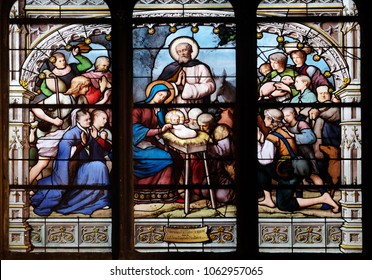 PARIS, FRANCE - JANUARY 04: Nativity Scene, Adoration of the Shepherds, stained glass window in Saint Severin church in Paris, France on January 04, 2018.