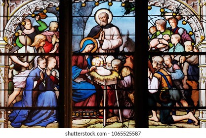 PARIS, FRANCE - JANUARY 04: Nativity Scene, Adoration of the Shepherds, stained glass window in Saint Severin church in Paris, France on January 04, 2018.