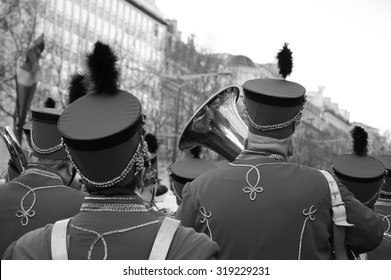 PARIS, FRANCE - JANUARY 1, 2015: Brass band participating in the New Year Parade on  Avenue des Champs-Elysees. Colorful New Year Parade is annual event.