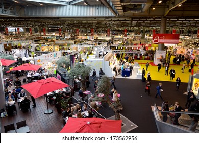 PARIS, FRANCE - JANUARY 27, 2014: People Visit Home Design Stands At Maison&Objet, The French Leading Professional Trade Show For Home Fashion In Paris, France.