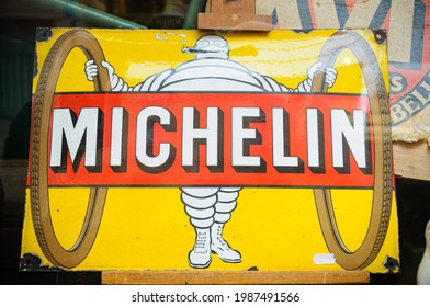 Paris, France. January 28th, 2012. Vintage-style Michelin Logo Sign On Tin Plate In A Thrift And Second Hand Shop.