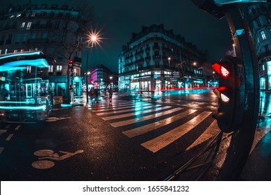 Paris, France: January 30, 2020: Pedestrian Walking Way View After Rain During Night