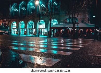 Paris, France: January 30, 2020: Pedestrian Walking Way View After Rain During Night