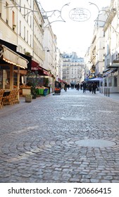 PARIS, FRANCE - JANUARY-18, 2017: Rue Cler - The Most Famous Market Street In Paris