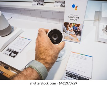 Paris, France - Jul 25, 2019: Man Hand Admiring Looking At The Nest Cam IQ New Premium Model Of Nest Cam Indoor. It Features A 4K Camera Sensor With HDR