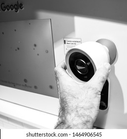 Paris, France - Jul 25, 2019: Man Hand Looking At The Nest Cam IQ On Wall New Premium Model Of Nest Cam Indoor Featuring A 4K Camera Sensor With HDR