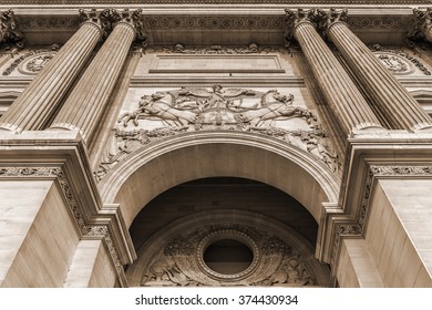 PARIS, FRANCE - JULY 13, 2014: View fragments of Louvre buildings in Louvre Museum. Louvre is one of the largest and most visited museums worldwide. Vintage, sepia. - Shutterstock ID 374430934