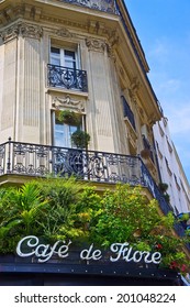 Paris, France - July 14, 2011 - The Sign For The Famous Cafe De Flore On The Left Bank Of Paris. The Cafe Lifestyle Draws Millions Of Tourists To Paris Each Year.