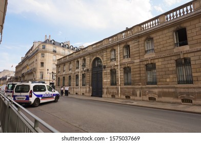 Paris, France - July 2019 - Exterior Facade Of The West Wing Of Élysée Palace, Official Residence Of The French President Of The Republic, Guarded By Police Officers, In Faubourg Saint-Honoré Street