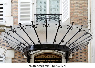 PARIS, FRANCE - JULY 23, 2017: Art Nouveau canopy in glass and black wrought iron in Paris, France