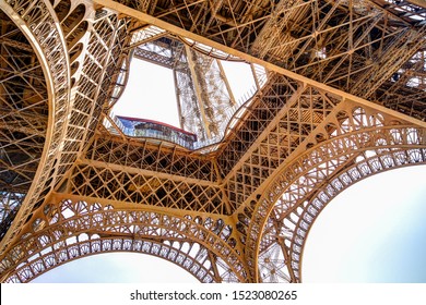 Paris, France - July 6, 2019: Architectural details of the Eiffel Tower  from below