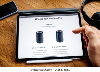 Paris, France - Jun 6, 2019: Man Reading On Apple IPad Pro Tablet About Latest Announcement Of At Apple Worldwide Developers Conference WWDC - Showing The Old 6 And 8 Core Duag GPu Trash Can Pro