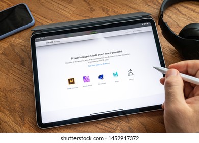 Paris, France - Jun 6, 2019: Man Reading On Apple IPad Pro Tablet About Latest Announcement Of At Apple Worldwide Developers Conference WWDC - Showing The Sidecar Feature