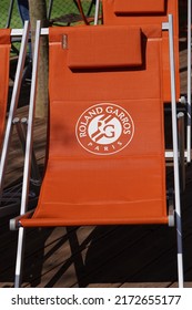 PARIS, FRANCE - JUNE 1, 2022: Spectator Lounge Chair With Roland Garros Logo At Le Stade Roland Garros In Paris, France