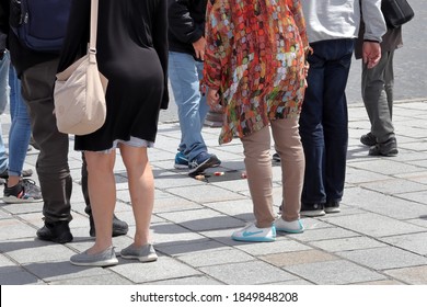 Paris / France - June 10, 2019: Con Artists Perform Illegal Shell Game, Confidence Trick Scam,  Performed With Matchboxes