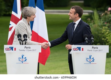 PARIS, FRANCE - JUNE 13, 2017 : The Prime Minister of United Kingdom Theresa May with the french President Emmanuel Macron in press conference in the gardens of Elysee Palace about working visit.