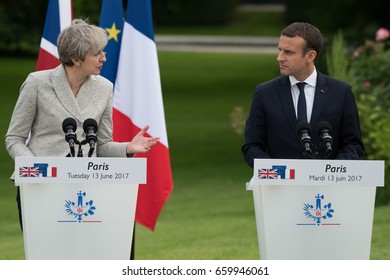 PARIS, FRANCE - JUNE 13, 2017 : The Prime Minister of United Kingdom Theresa May with the french President Emmanuel Macron in press conference in the gardens of Elysee Palace about working visit.