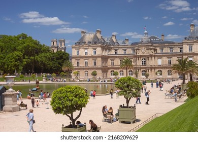 PARIS, FRANCE - June 14, 2022: Luxembourg Gardens in Paris. Garden chairs in Paris. Metal sun loungers for relaxing in the park