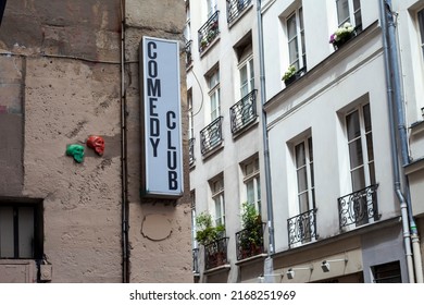 PARIS, FRANCE - June 16, 2022: Comedy Club Signboard On The Building Wall