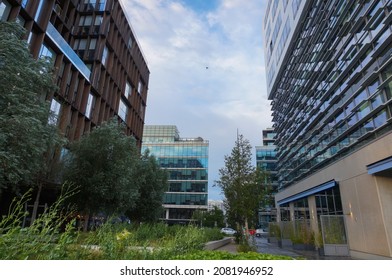 Paris, France - June 2021 - Modern Glass Office Buildings And Company Headquarters Around A Square With Trees And Green Plants, Near Pierre Mendès-France Avenue, In Paris-Rive Gauche Business District