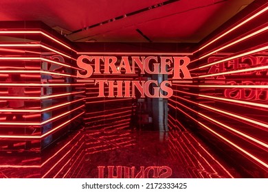 Paris, France - June 27, 2022: Red Neon Logo Stranger Things At The Entrance Of Pop-up Store On Avenue Champs Elysees